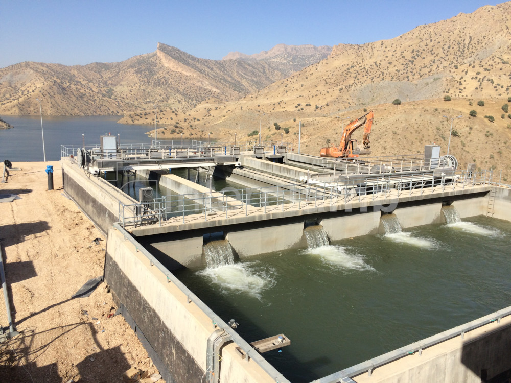 Safety balustrades and handrails constructed with Interclamp key clamp fittings at a water treatment works in Kurdistan, ensuring personnel protection in a hazardous workplace.